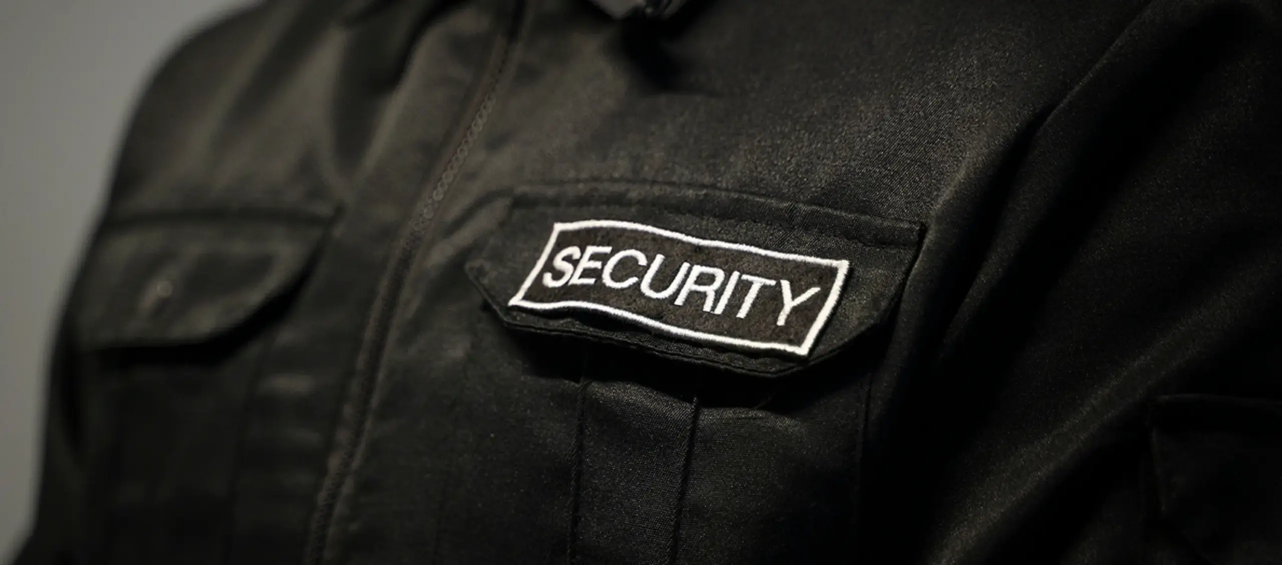 Nahaufnahme einer schwarzen Security Uniform